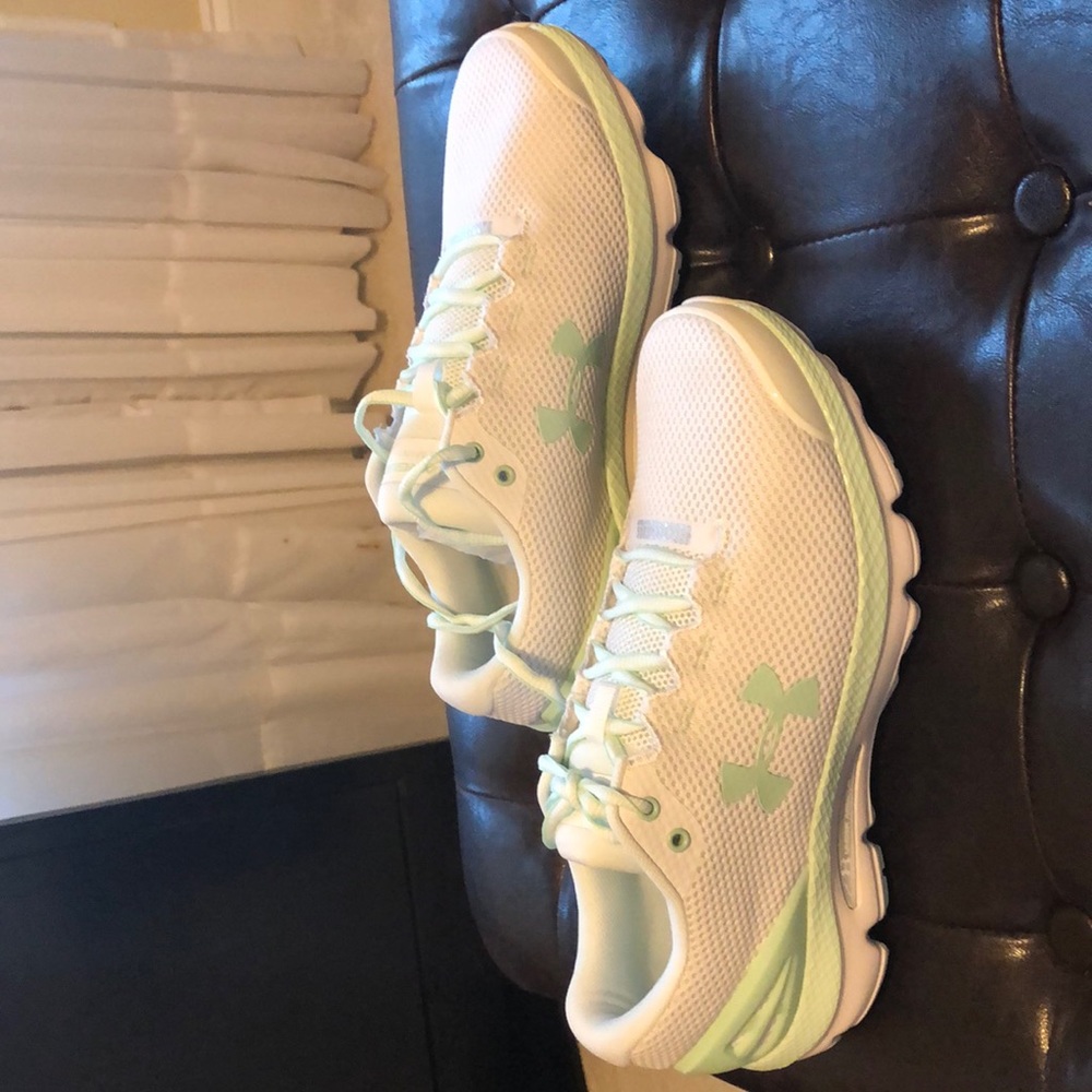 Under Armour, size 9.5 .Color white and mint green in original box.